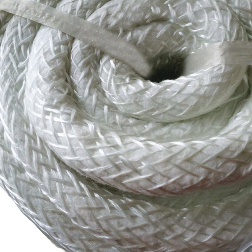 Coiled ceramic fibre rope with braided texture for high-temperature insulation and sealing, rated to 1260 °C, displayed on pale grey background