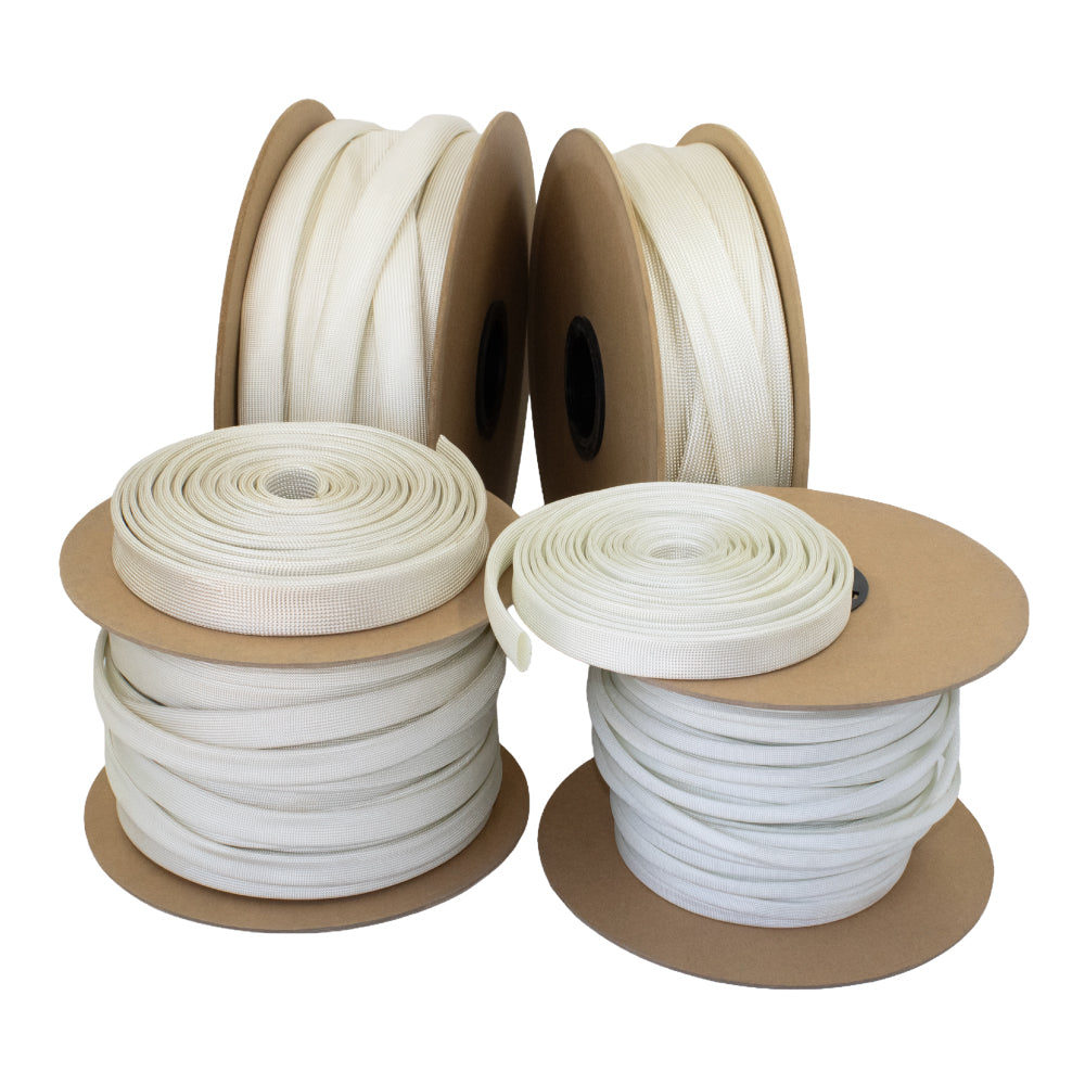 Multiple spools of natural high-temperature fibreglass sleeving in various diameters, designed for electrical insulation and thermal protection up to 260°C.