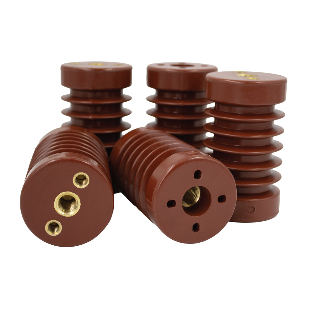 Brown high-voltage motor insulators with grooved bodies and brass inserts, designed for electrical insulation in high-temperature motor applications.