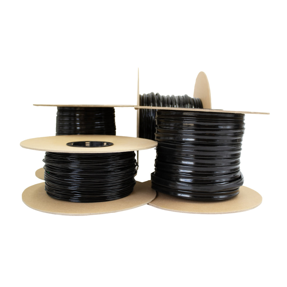 black silicon coated sleeving on cardboard spools for high-temperature electrical insulation, rated up to 220°C