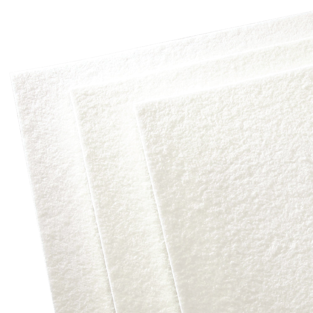 Sheets of white ceramic fibre paper for high-temperature insulation applications, offering low thermal conductivity and easy handling up to 1260 °C